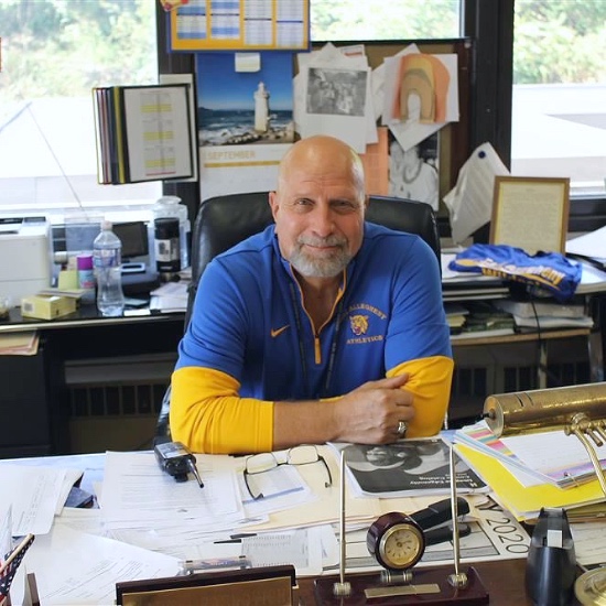  Mark Draskovich seated at his desk